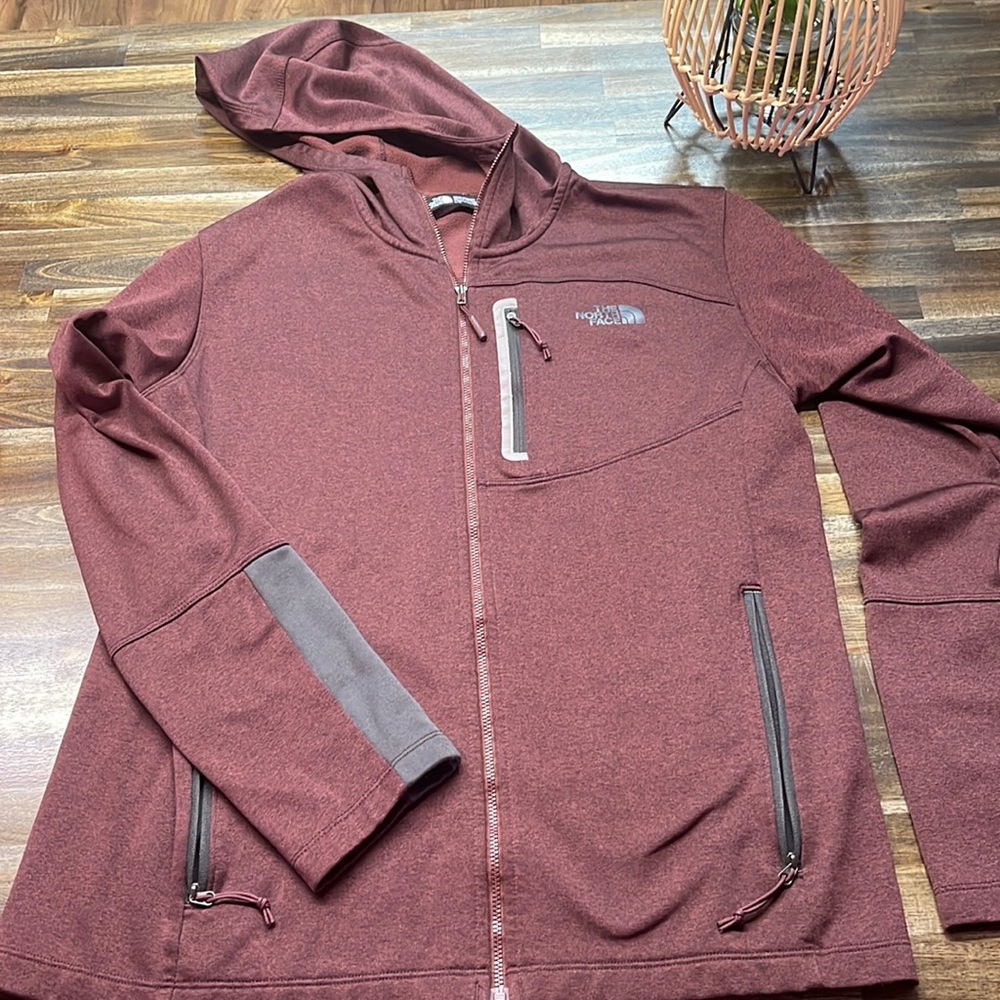 The NorthFace Men’s full zip-up.